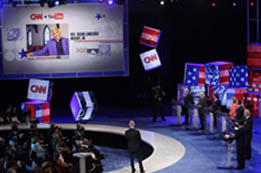 Democratic candidates field questions at the CNN/YouTube debate in South Carolina in July 2007. (© AP Images/Charles Dharapak)
