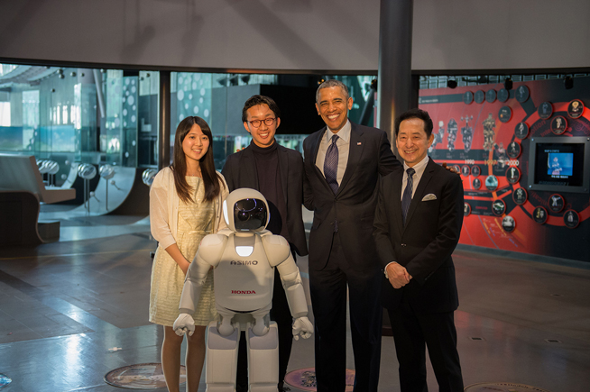 President Obama Poses for a Photo with ASIMO and Students