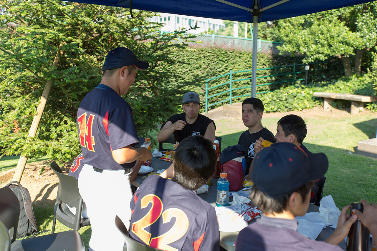 The young players chatted with the Marines about baseball.