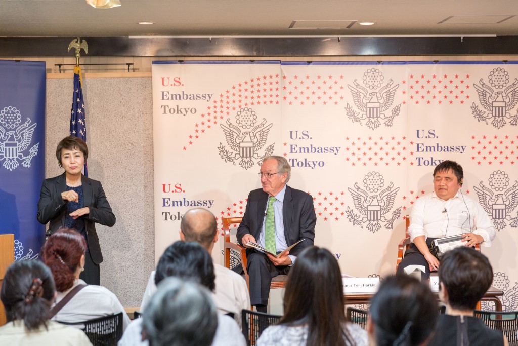 Former Senator Tom Harkin speaks on "26 years of the ADA: Successes and Next Steps" at the American Center Japan in Tokyo on September 26, 2016. Keiichi Tamaru, Assistant Secretary General, Japan National Assembly of Disabled People, moderated the event.