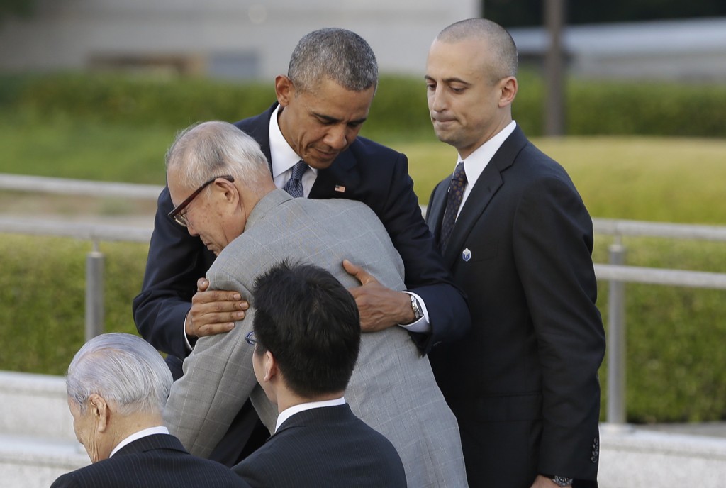 U.S. President Barack Obama hugs Shigeaki Mori at Hiroshima Peace Memorial Park in Hiroshima on May 27, 2016. (AP Photo/Carolyn Kaster)