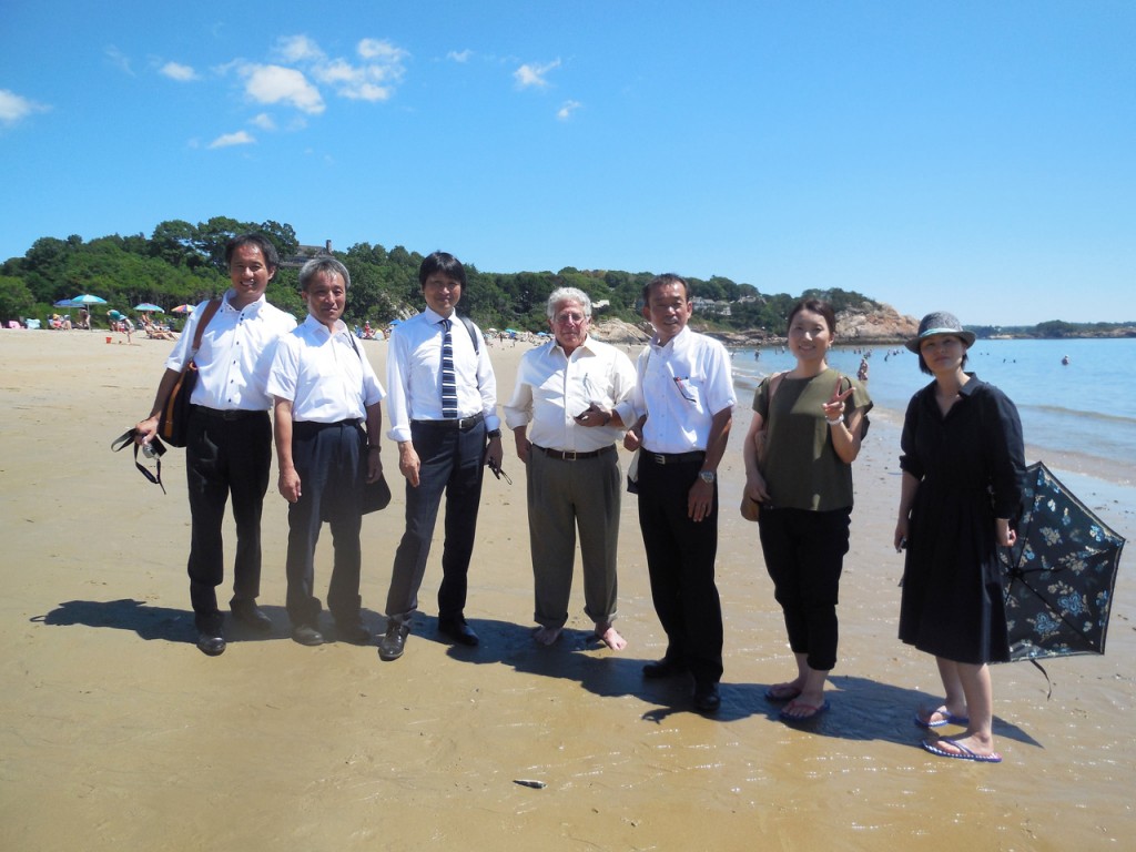 The delegation from Kyotango visits Singing Beach in Manchester-by-the-Sea with Peter Grilli, Senior Advisor of the Japan Society of Boston (center)