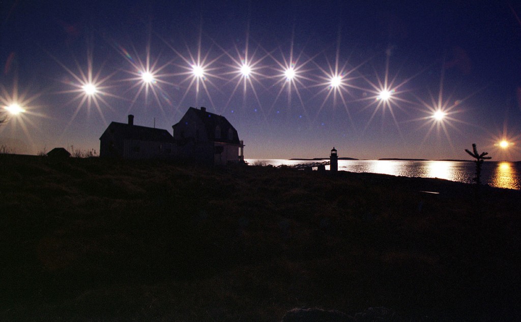 This multiple-exposure photo taken at St. George, Maine, shows the sun moving from sunrise to winter solstice to sunset. (© AP Images)