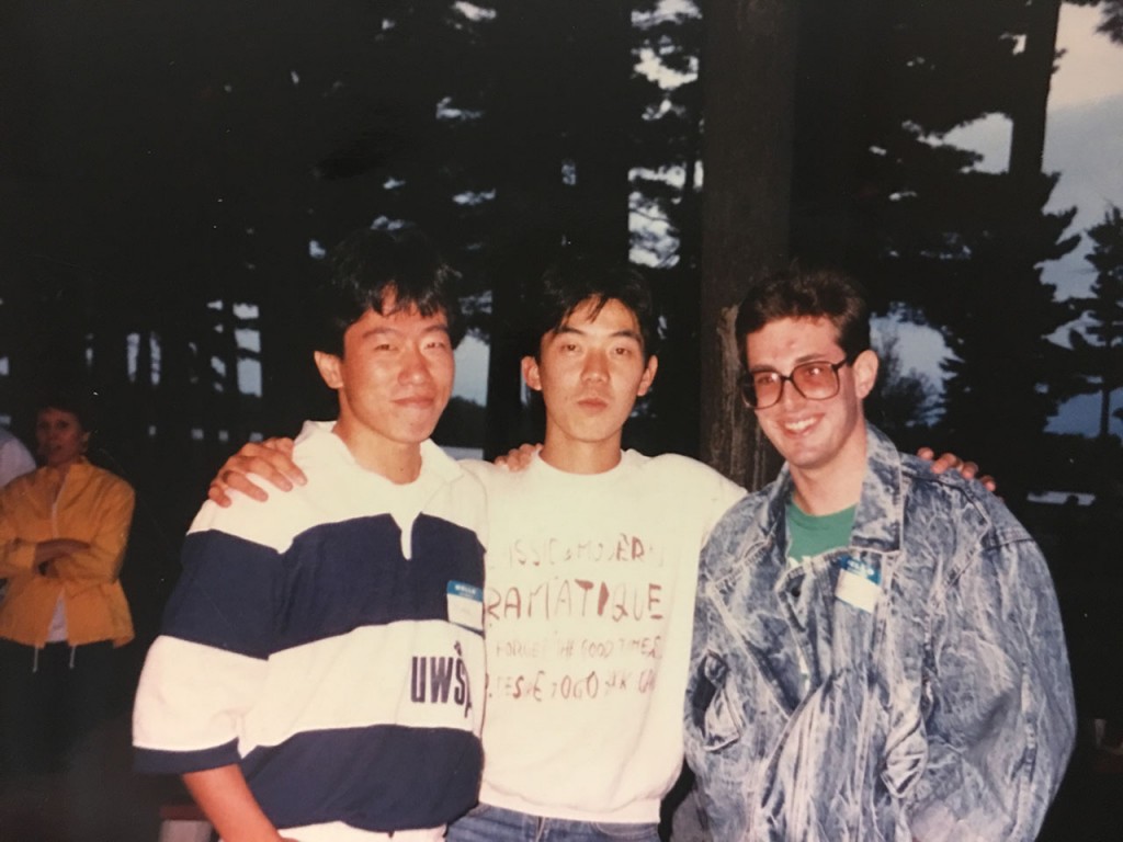 Masayoshi Suga (left) poses for a photo with friends from his language school in Wisconsin.