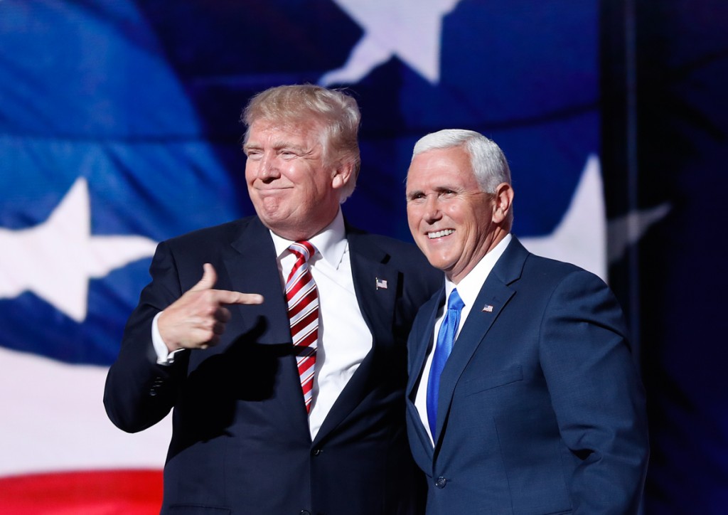 Then–presidential candidate Donald Trump stands with his running mate, Mike Pence, who became the 48th vice president. (© AP Images)