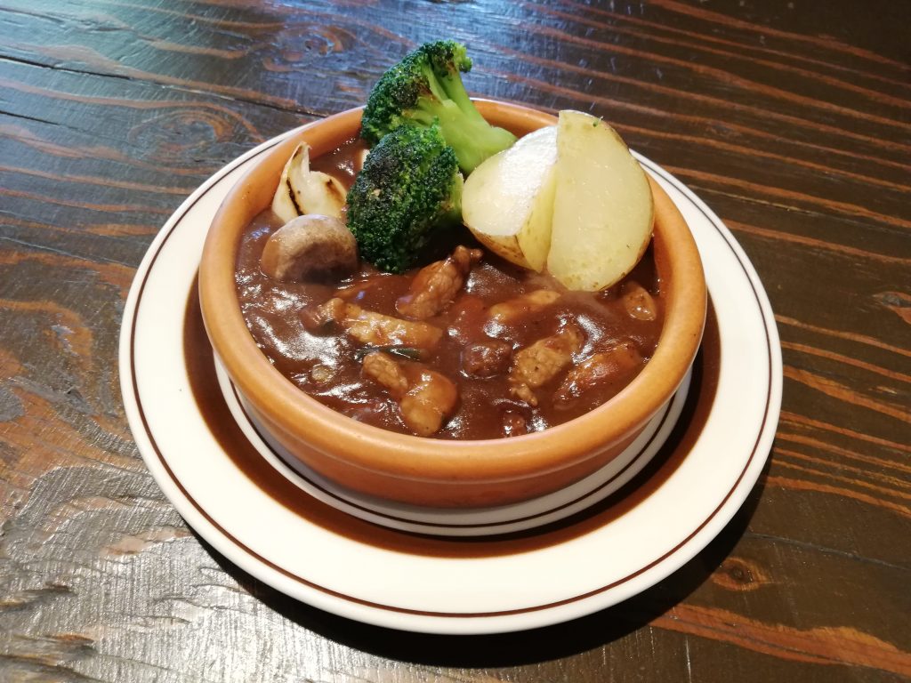 Brooklyn Diner's hearty stew of American beef tendon and short plate with potatoes and Cajun spice, simmered in Brooklyn Lager
