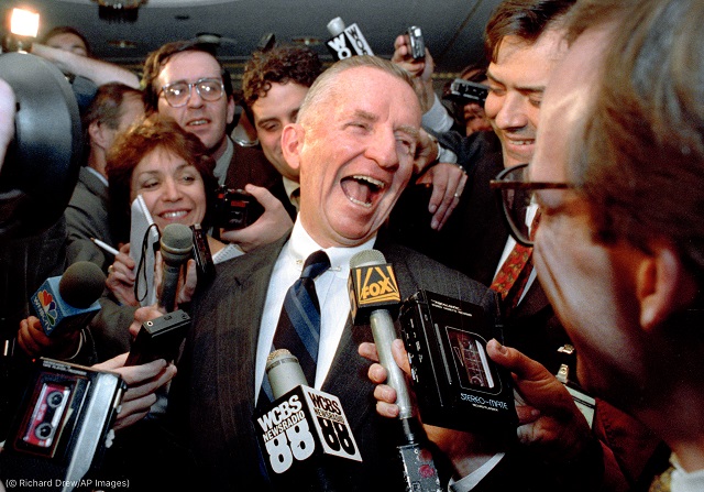 Texas billionaire Ross Perot laughs with reporters asking about his plans to enter the 1992 presidential race. (© Richard Drew/AP Images)