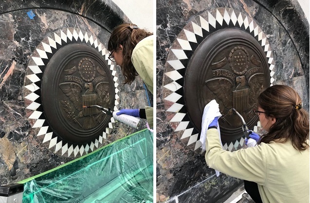 Lauren Hall, conservator, applying patina and wax to the bronze seal over the main entrance to the CMR.