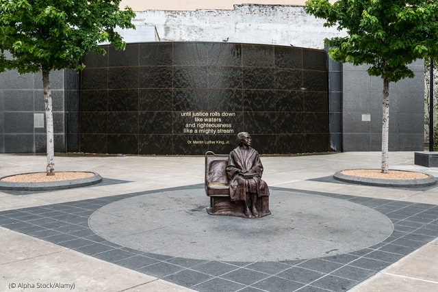 A statute commemorating Parks’ protest is the central feature of the West End Dallas Area Rapid Transit Station plaza in Dallas. (© Alpha Stock/Alamy)