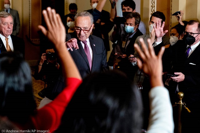 Politicians, such as Senate Majority Leader Chuck Schumer of New York (center), shown this year, are accustomed to fielding pointed questions from reporters. (© Andrew Harnik/AP Images)