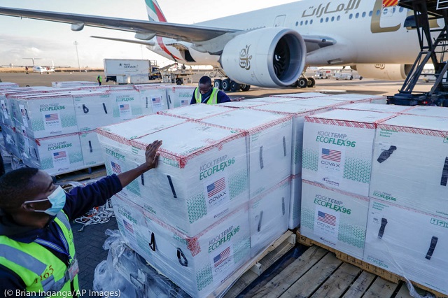 The U.S. is the largest single country donor in support of the global vaccine initiative COVAX. An August shipment of vaccines via COVAX to Kenya is seen above. (© Brian Inganga/AP Images)