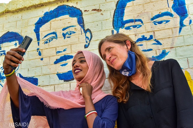 USAID Administrator Samantha Power takes a selfie with a woman during her visit to Sudan in August 2021. (USAID)