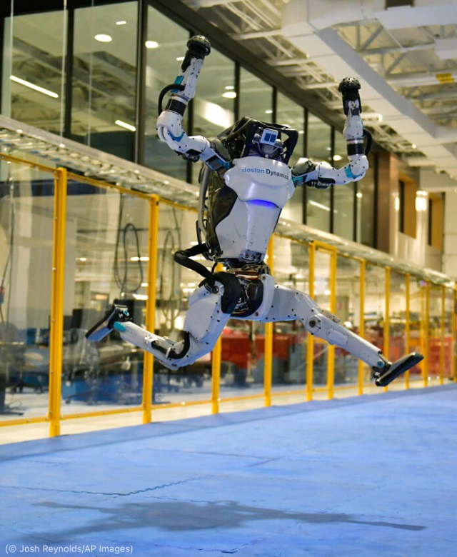 A Boston Dynamics Atlas robot dances. (© Josh Reynolds/AP Images)