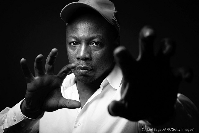 French rapper Claude M’Barali, whose stage name is MC Solaar, poses during a photo session in Paris in September 2021. (© Joel Saget/AFP/Getty Images)