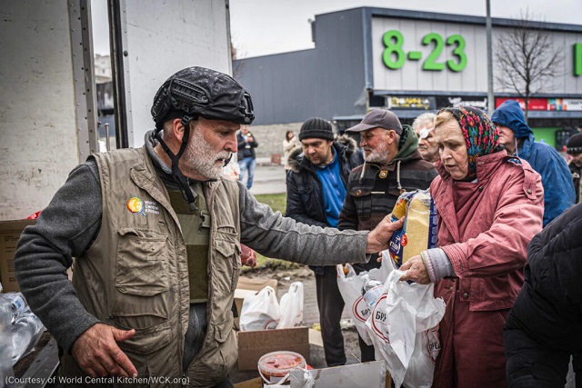 José Andrés helps residents in Bucha, on the outskirts of Kyiv, as they collect food to go. (Courtesy of World Central Kitchen/WCK.org)