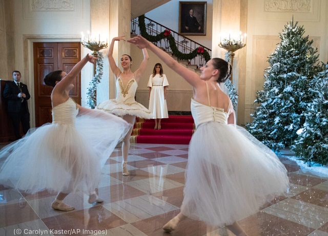 First lady Melania Trump watches ballerinas perform a piece from “The Nutcracker” among the 2017 White House holiday decorations. (© Carolyn Kaster/AP Images)