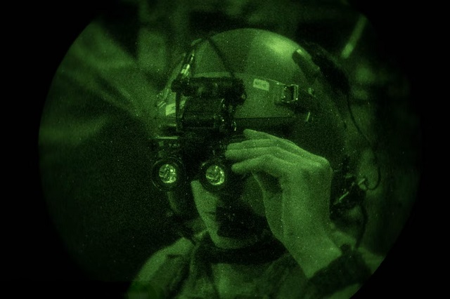 U.S. airmen received counterfeit uniforms that would have been visible to enemy night-vision goggles, similar to the one worn by the U.S. service member above. (US Air Force/Staff Sergeant Rion Ehrman)