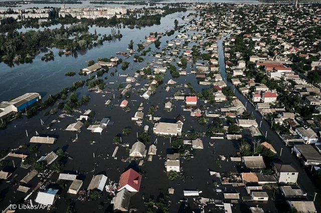 Streets are flooded in Kherson, Ukraine, June 7 after the destruction of the Kakhovka Dam. (© Libkos/AP)